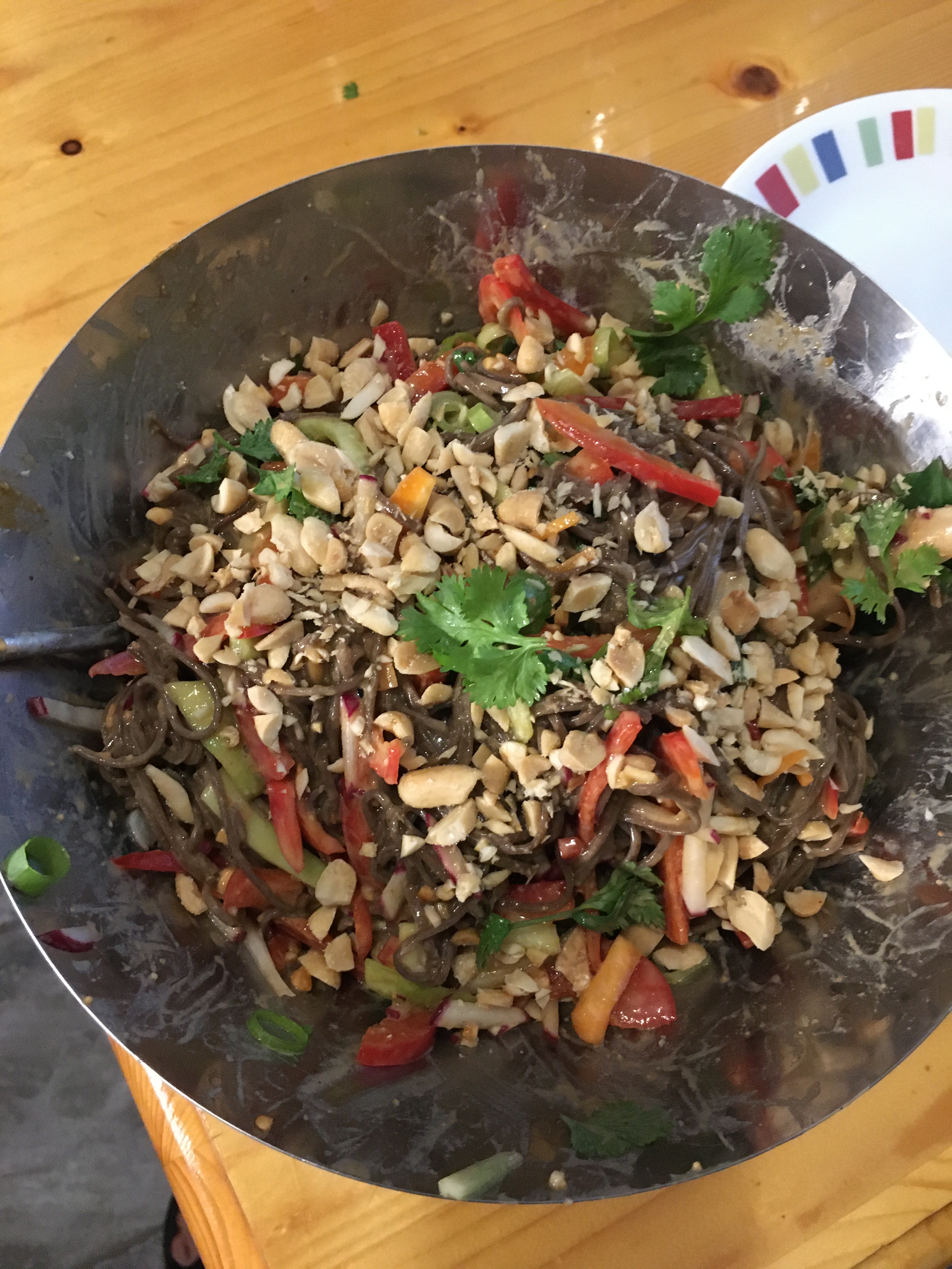 Buckwheat Noodle dish with peanuts on top