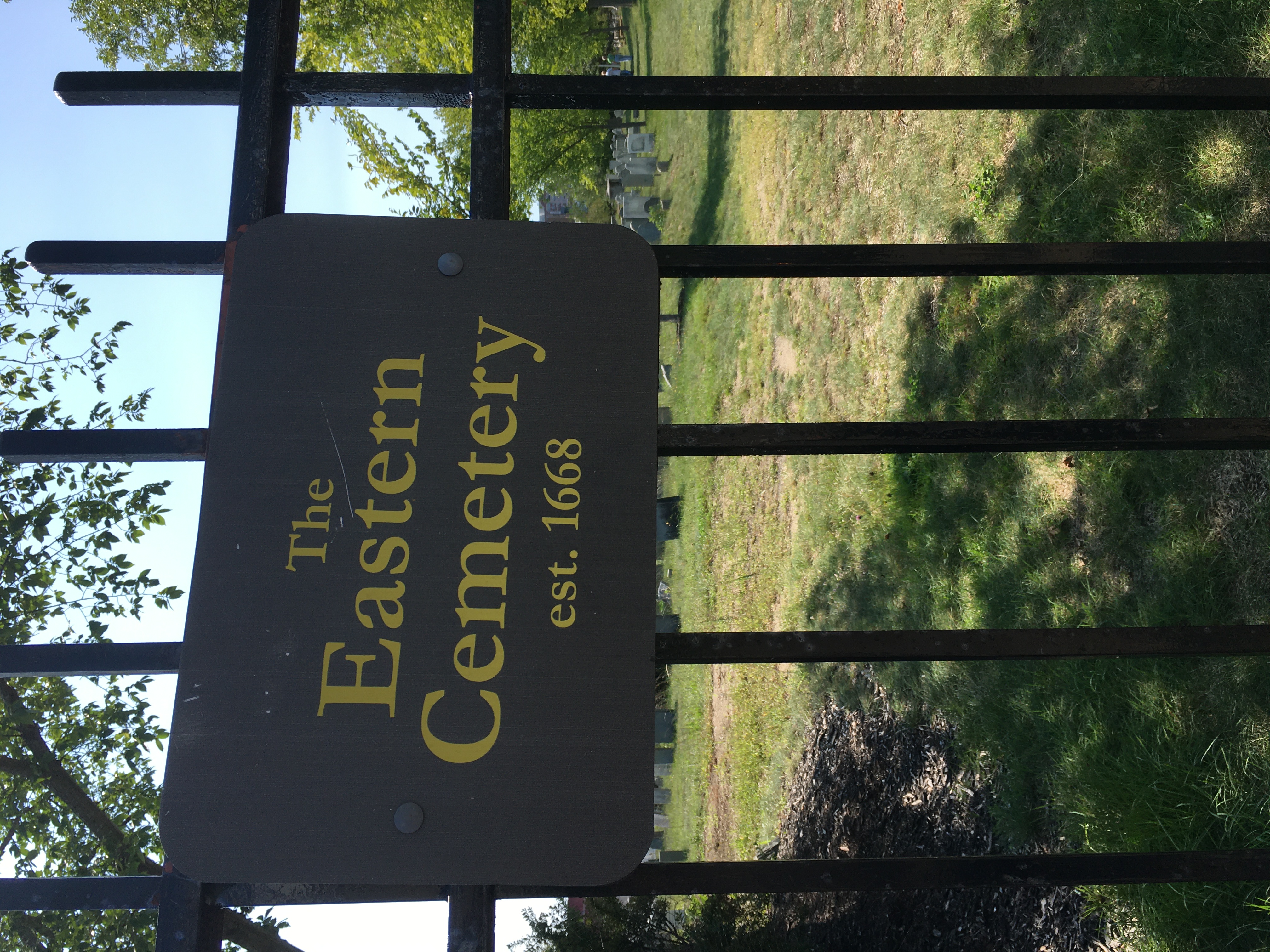 A sign that says Eastern Cemetery 1668