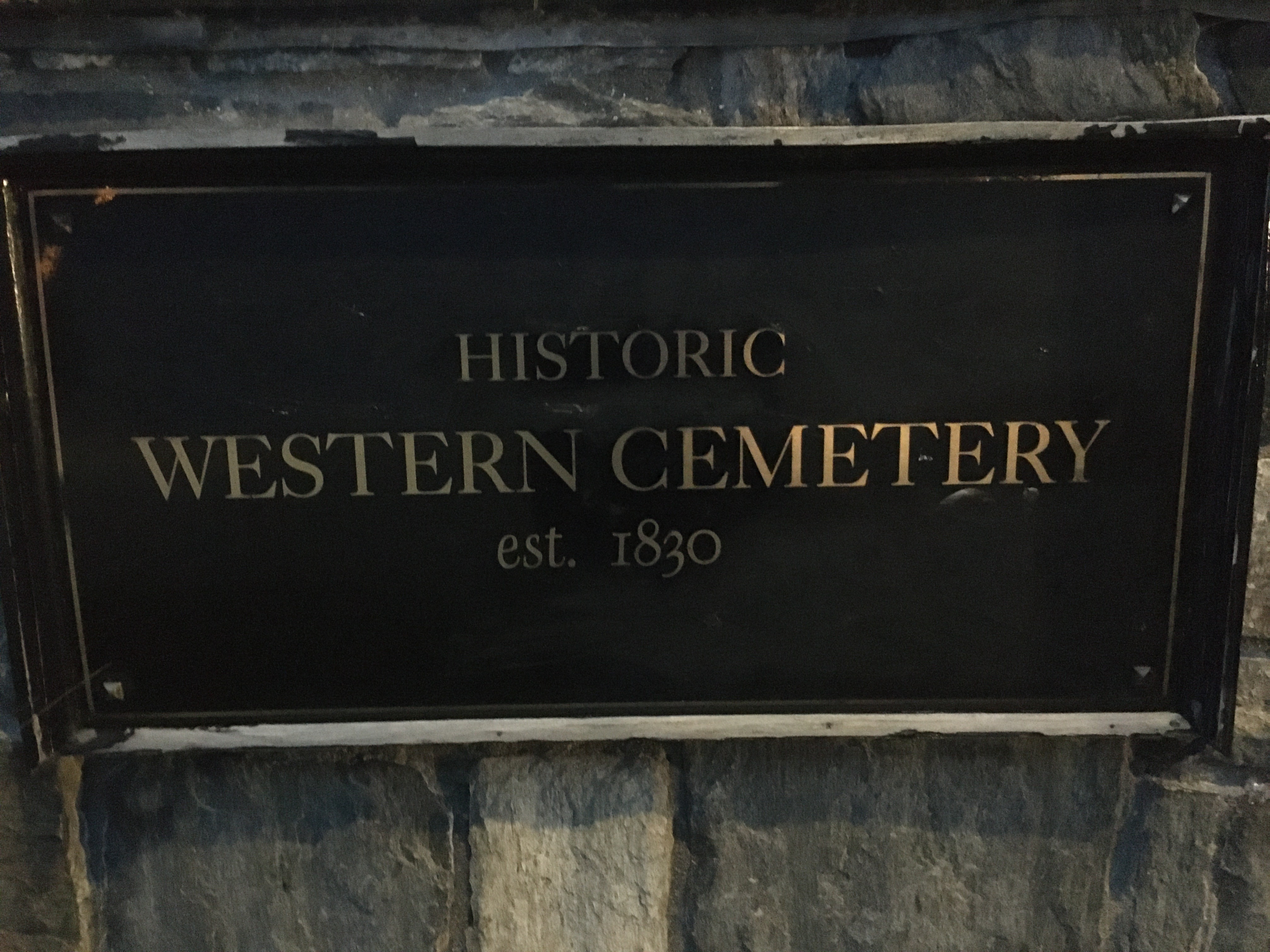 A sign that reads Historic Western Cemetery 1830