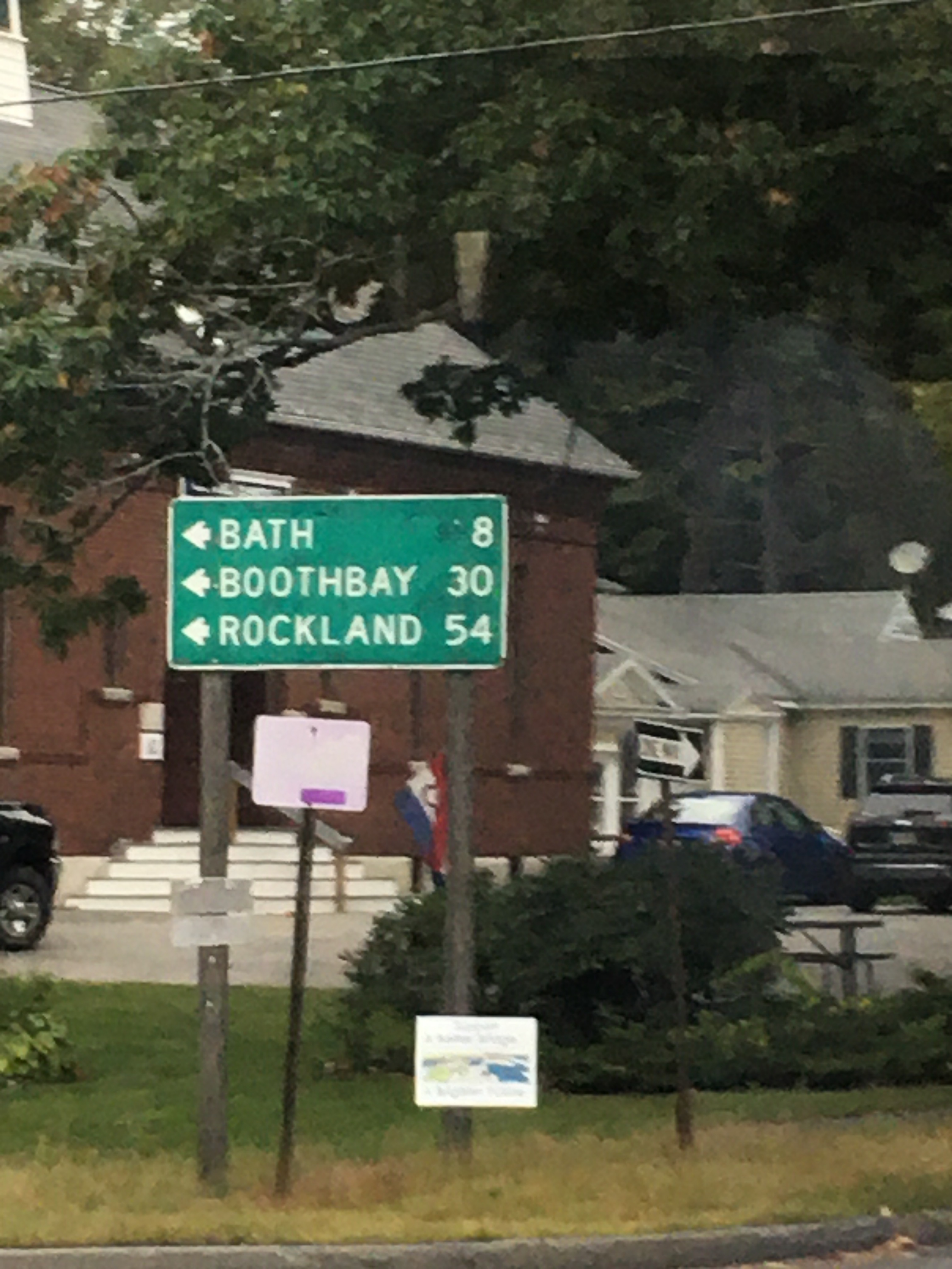 A traffic sign saying Rockland 54 miles