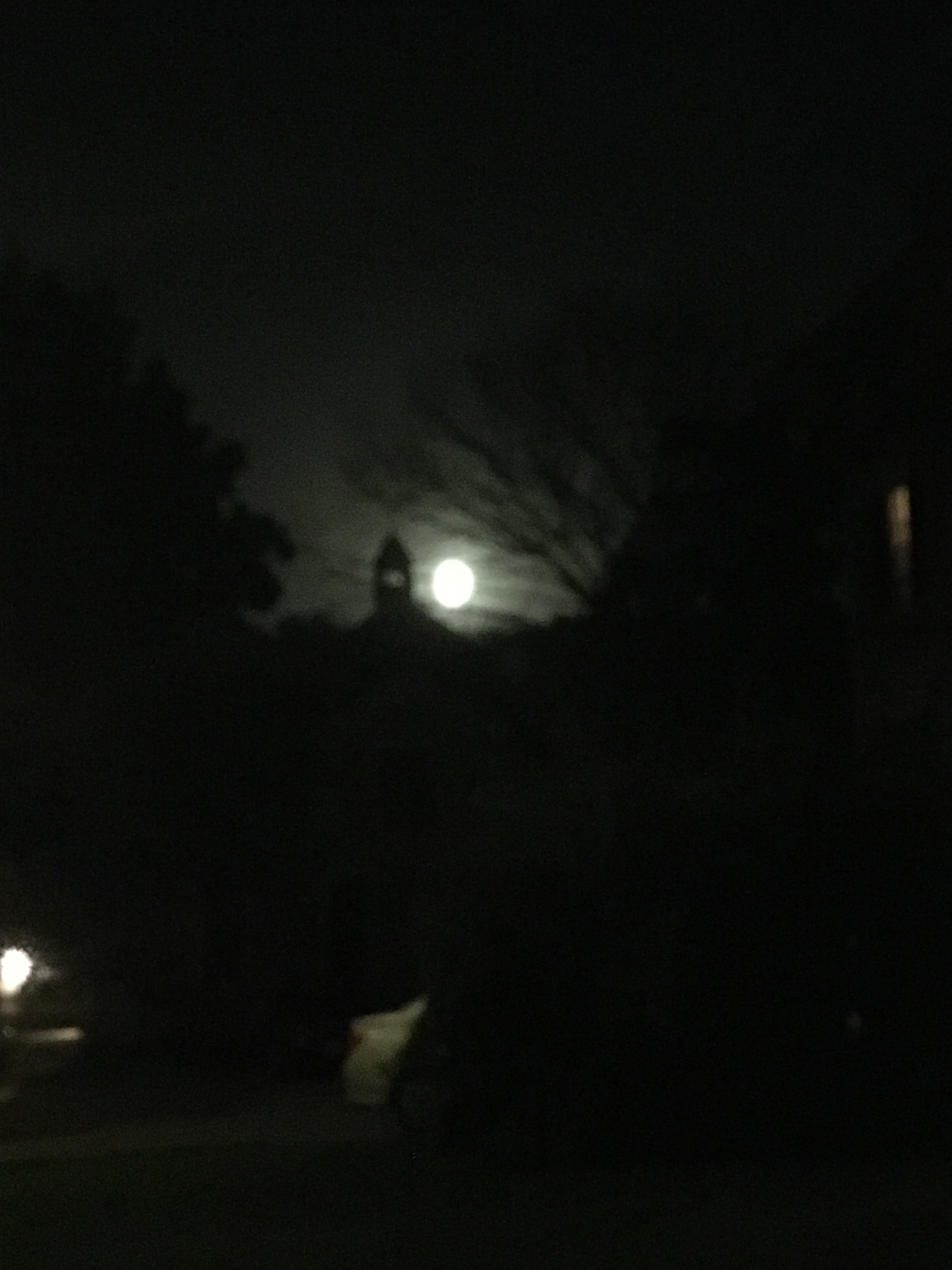 full moon a church tower