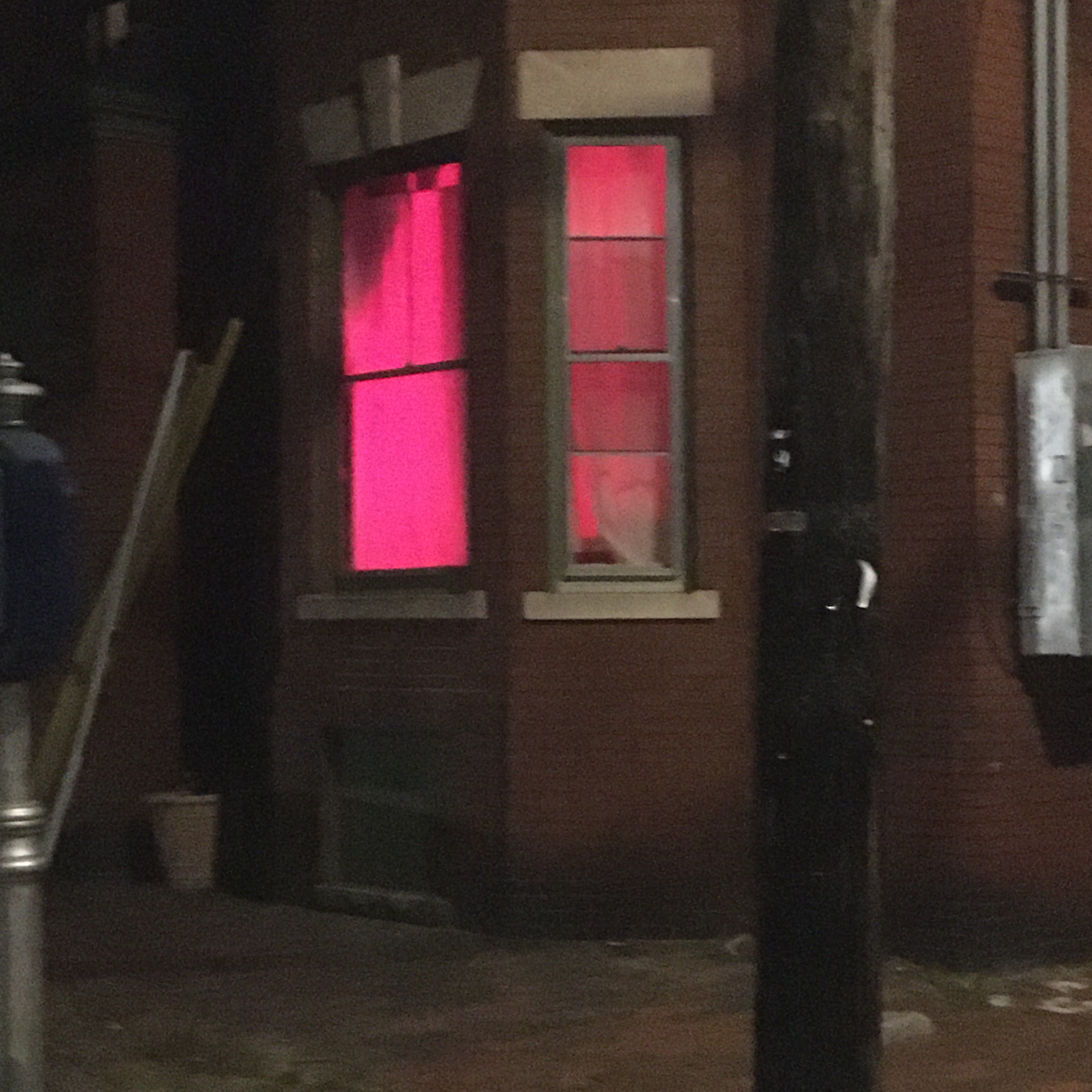 window with red curtains