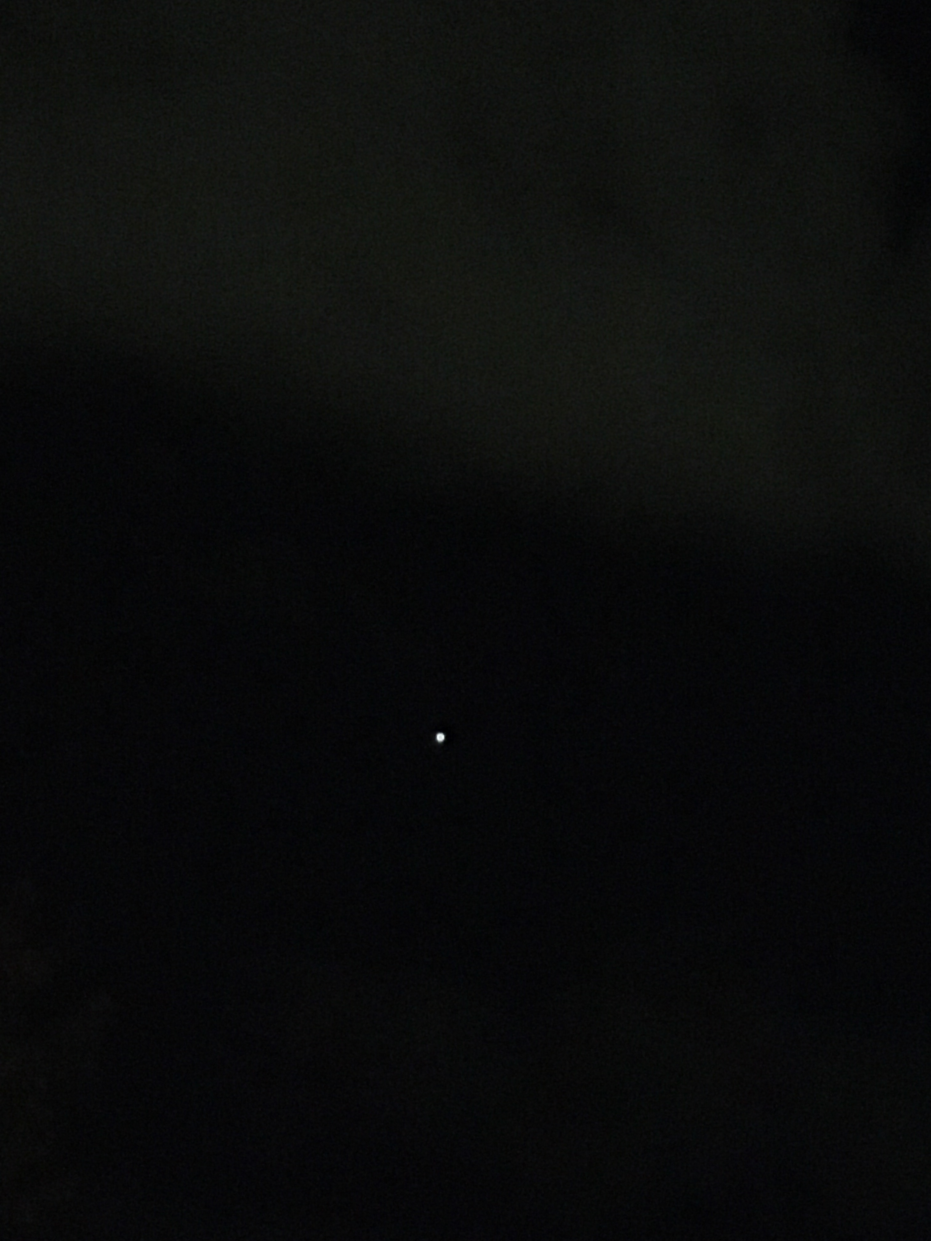 white dot in a black image