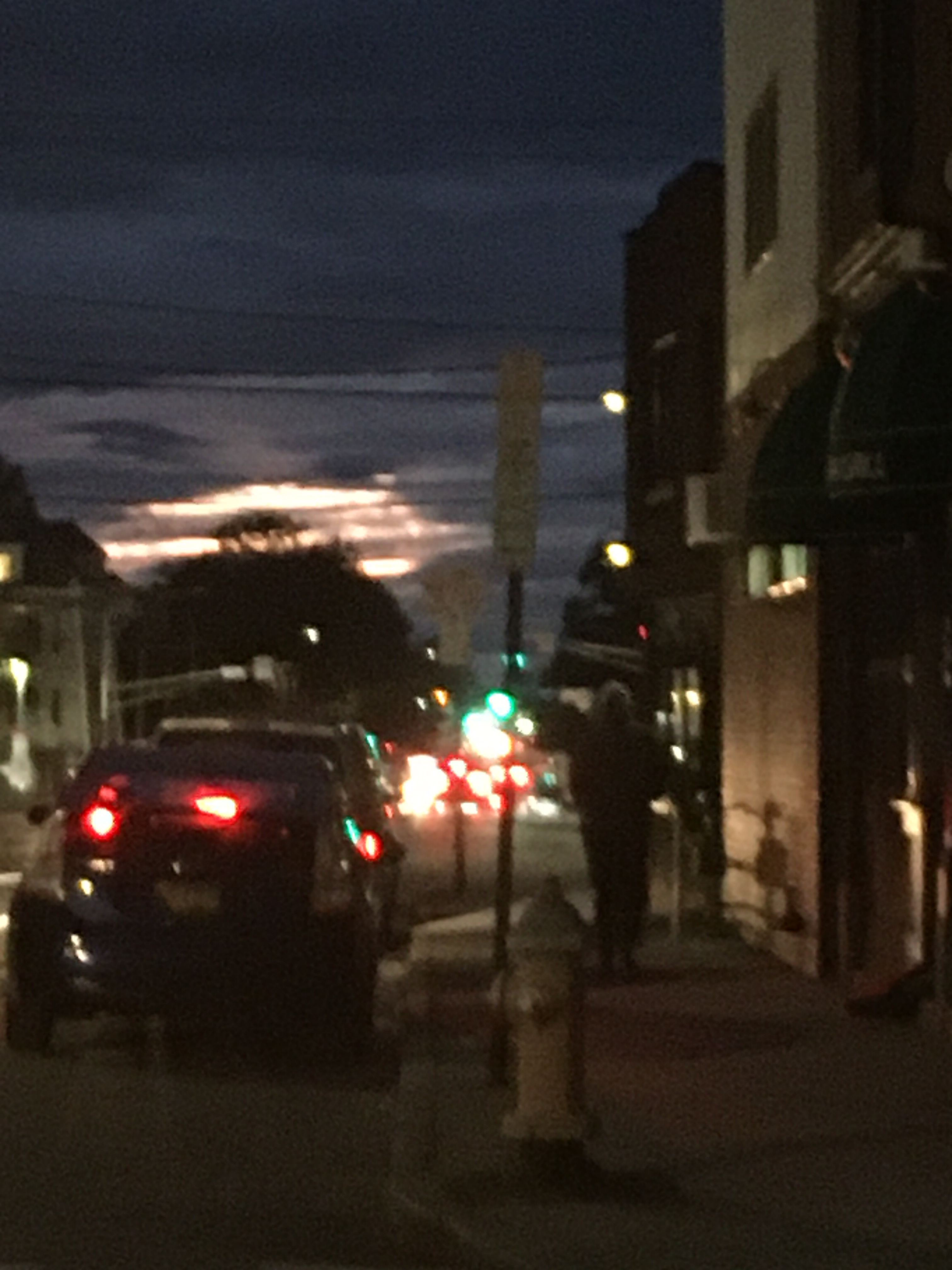 blurry sunset with traffic lights in the foreground