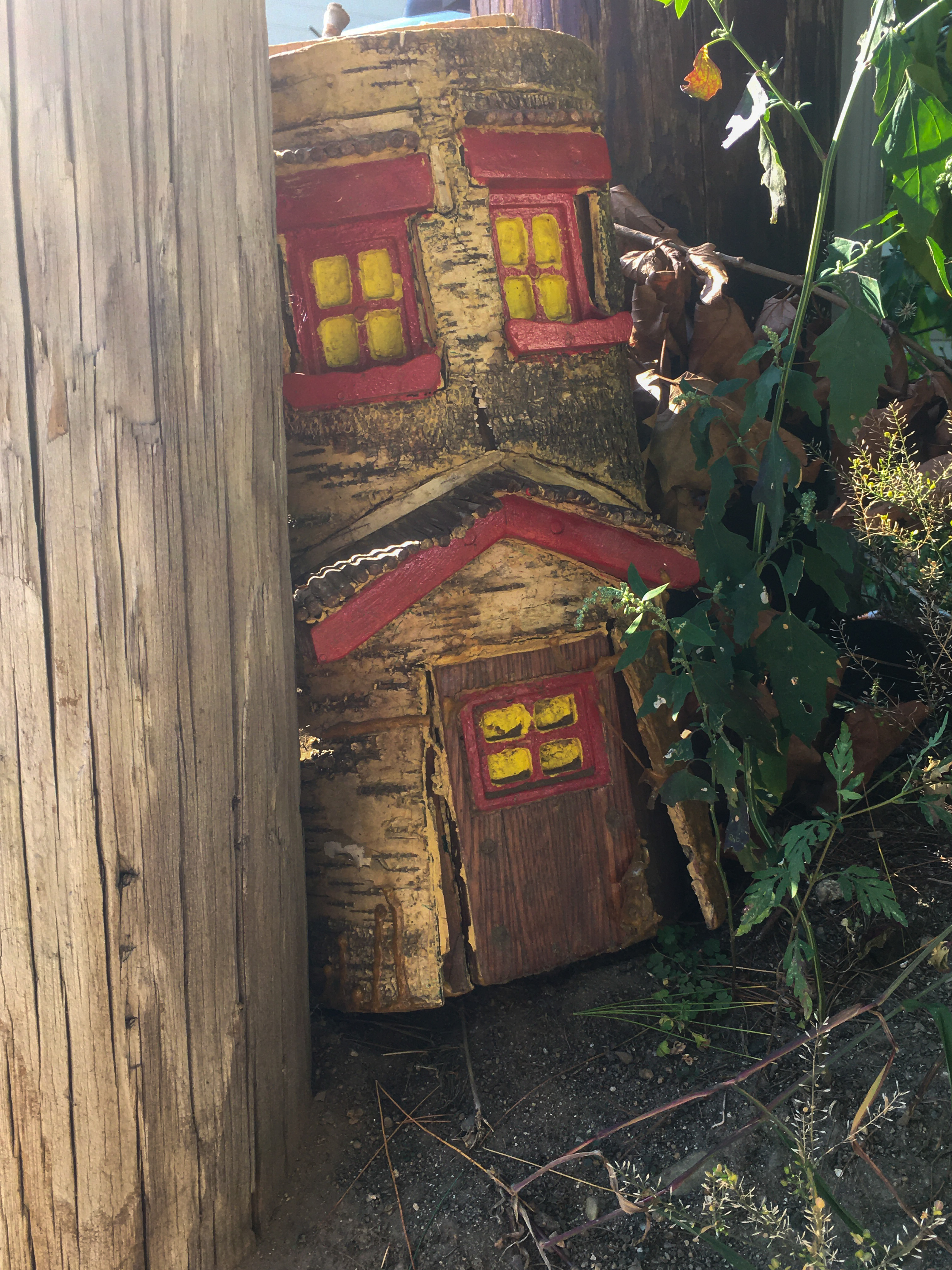small house cut in a log