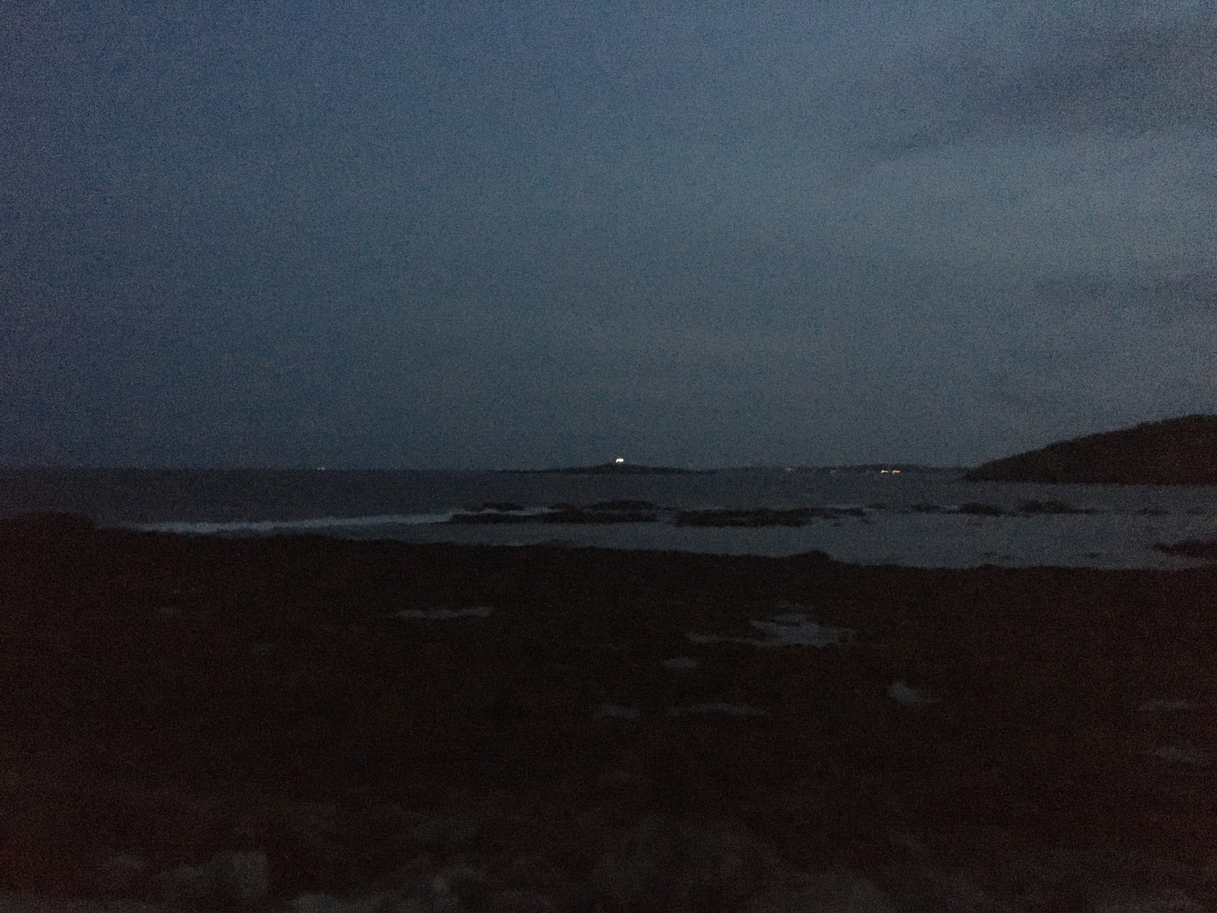 light house over a dark sea