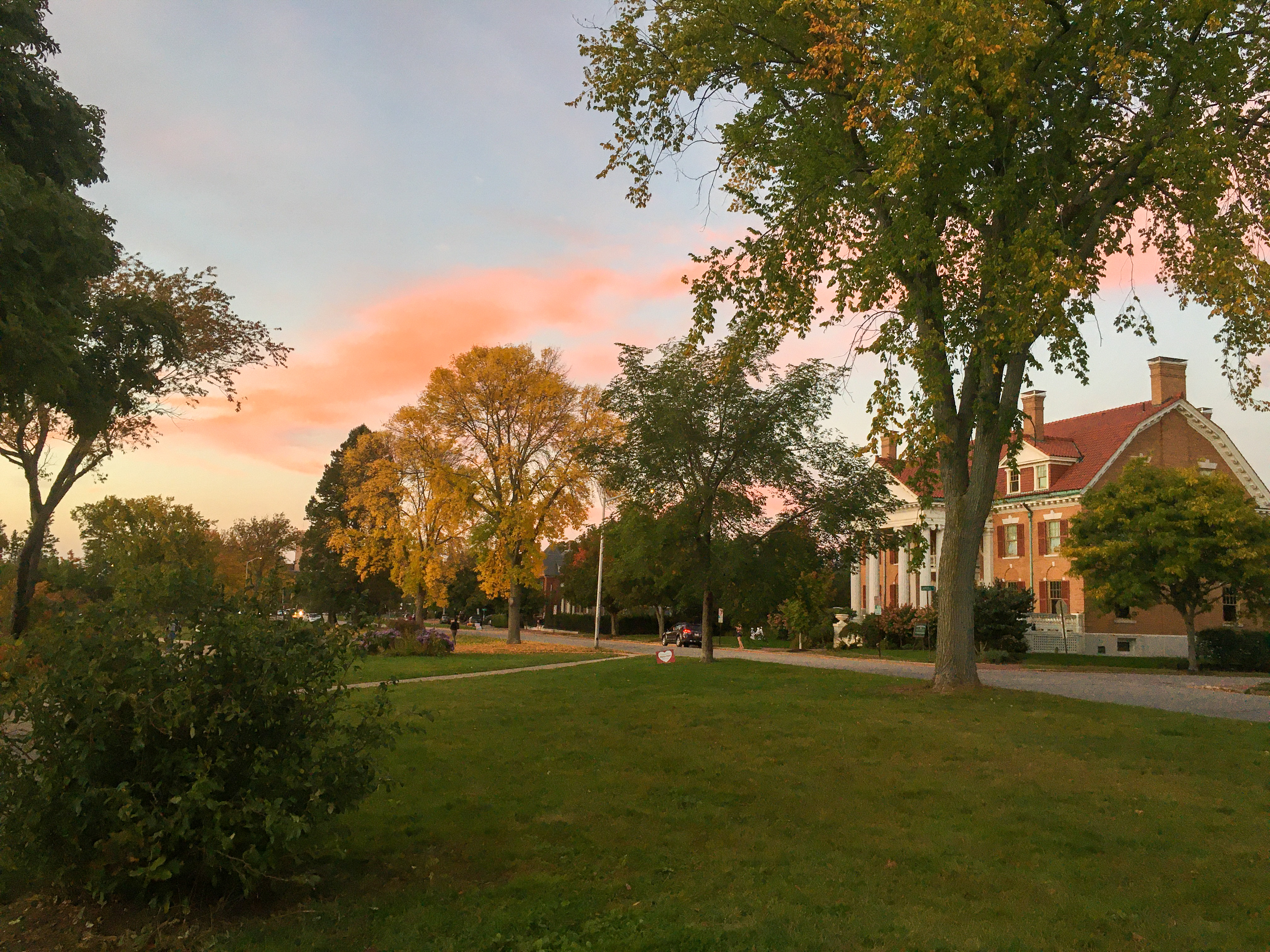 Houses and sunset and foliage on the Western Prom in Portland Maine