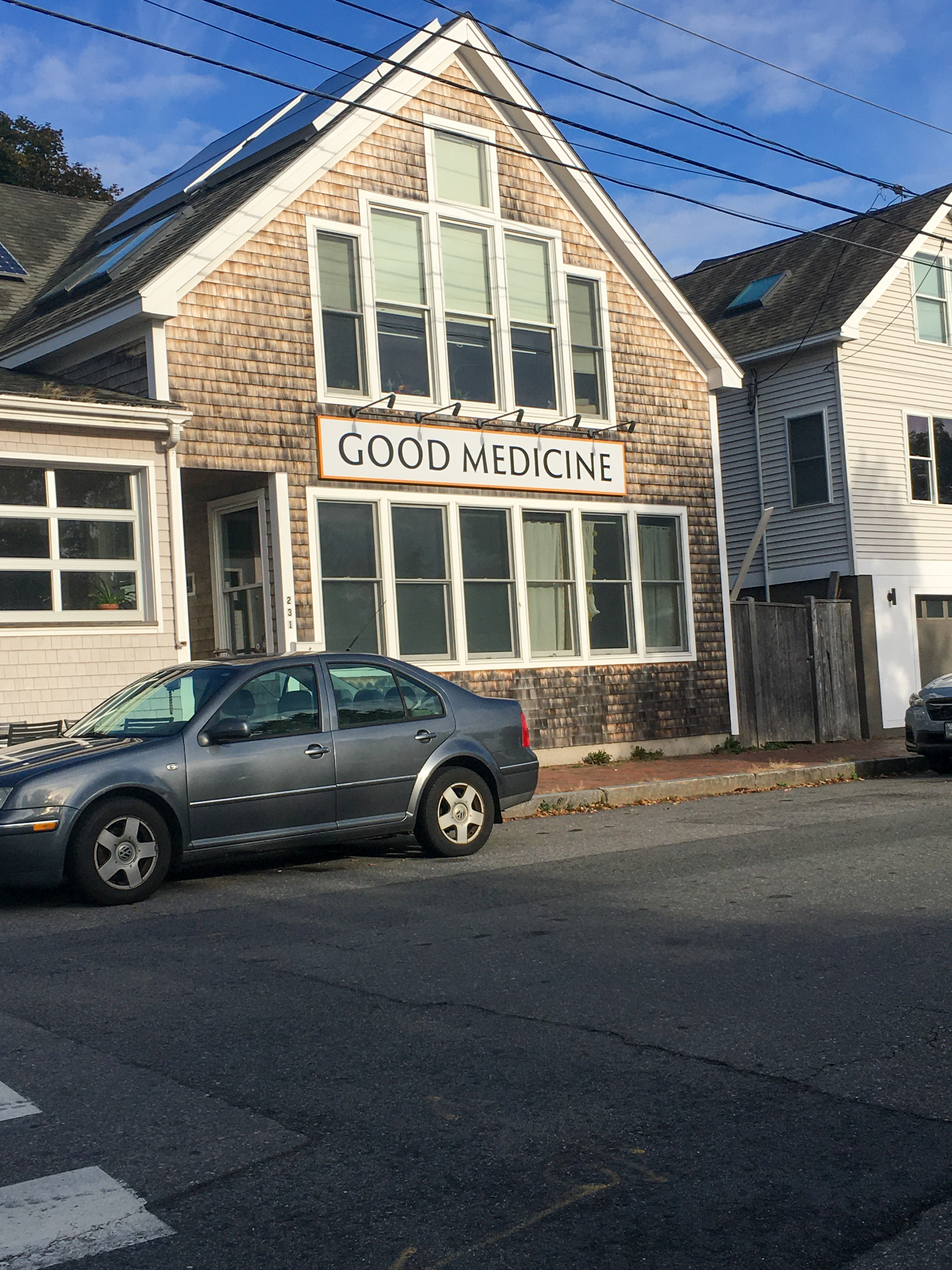 sign on a building that reads good medicine