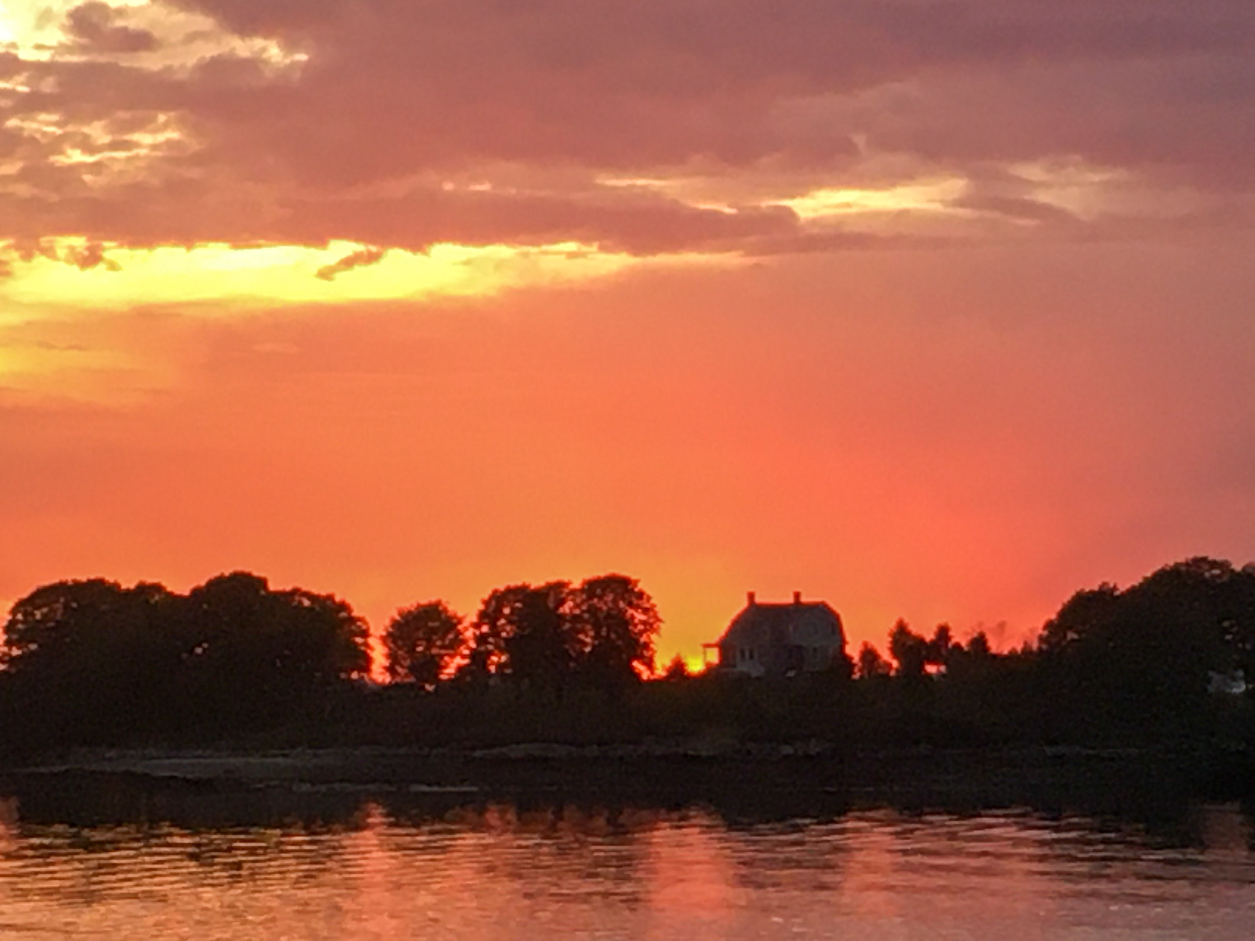 islands silhouetted against an amazing sunset