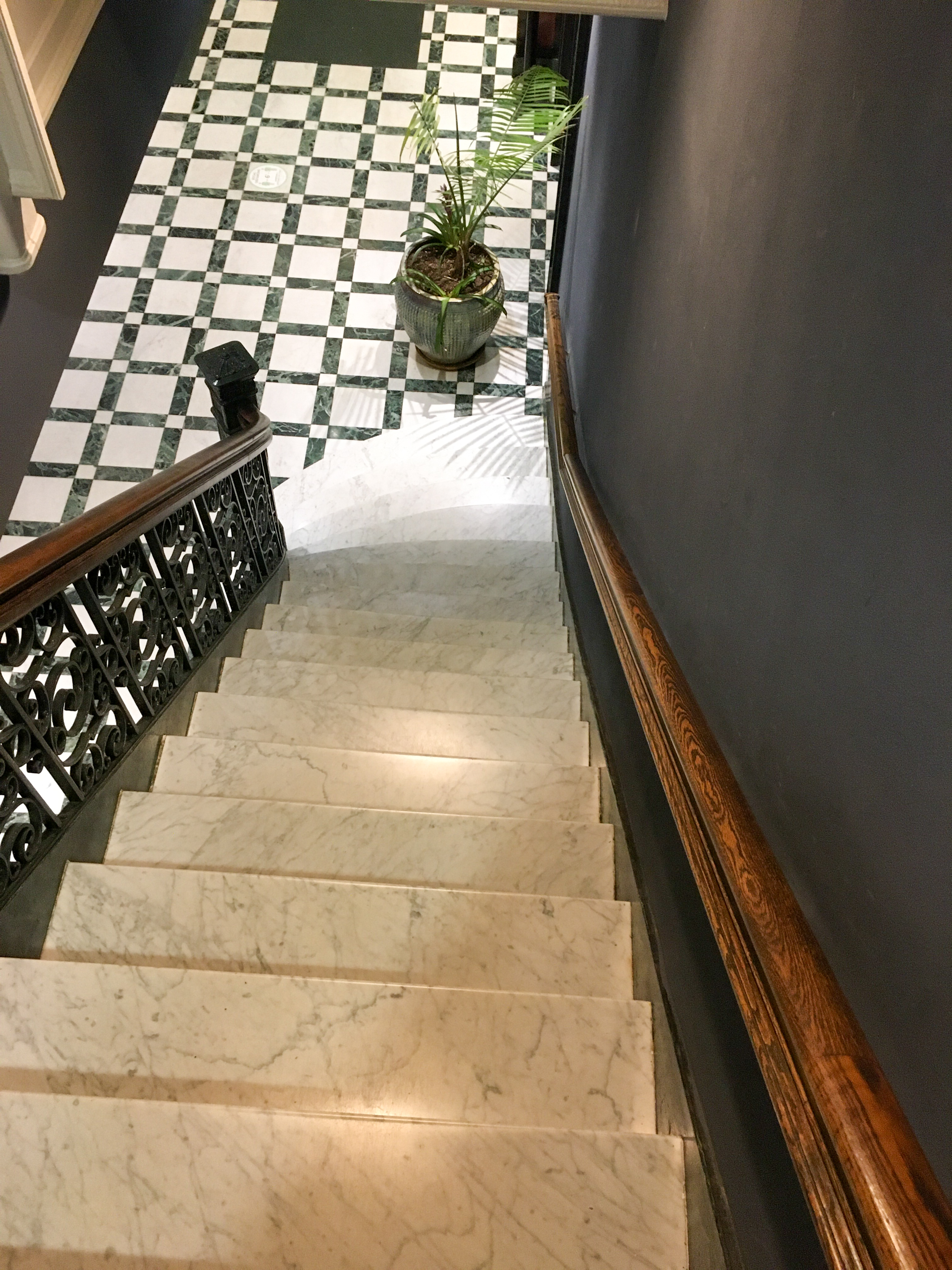 stairway down to the first floor of the hotel