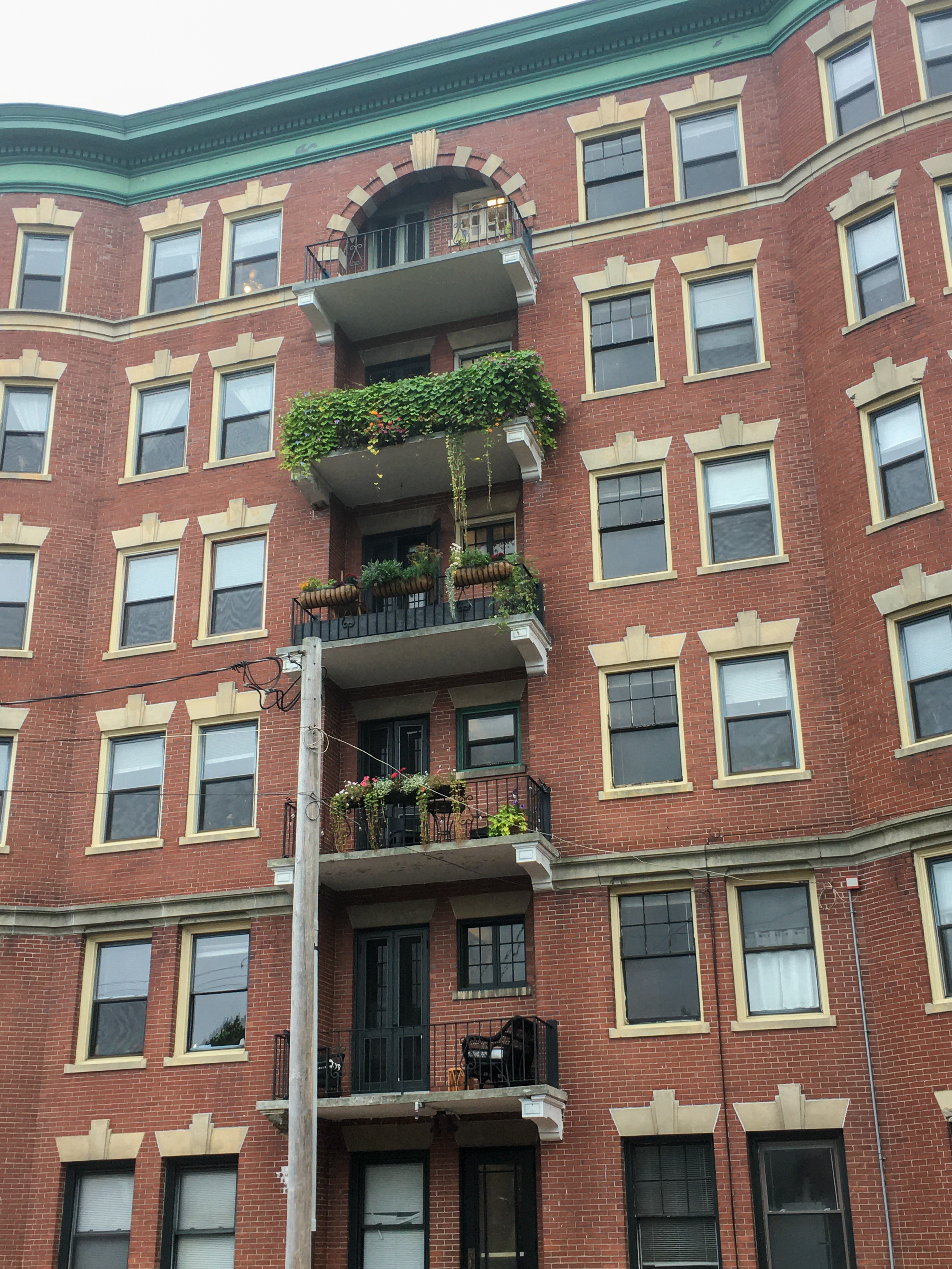 large brick building with balconies
