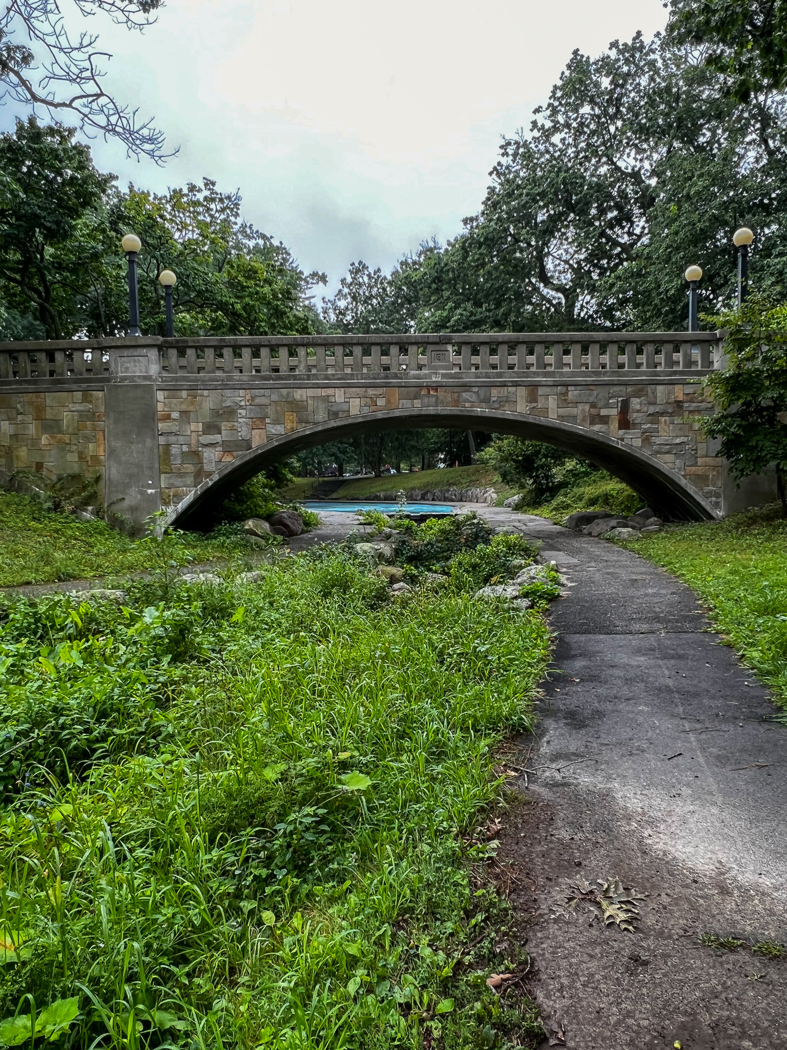 arched stone bridge from 1911 for pedestrians in Deering park portland maine