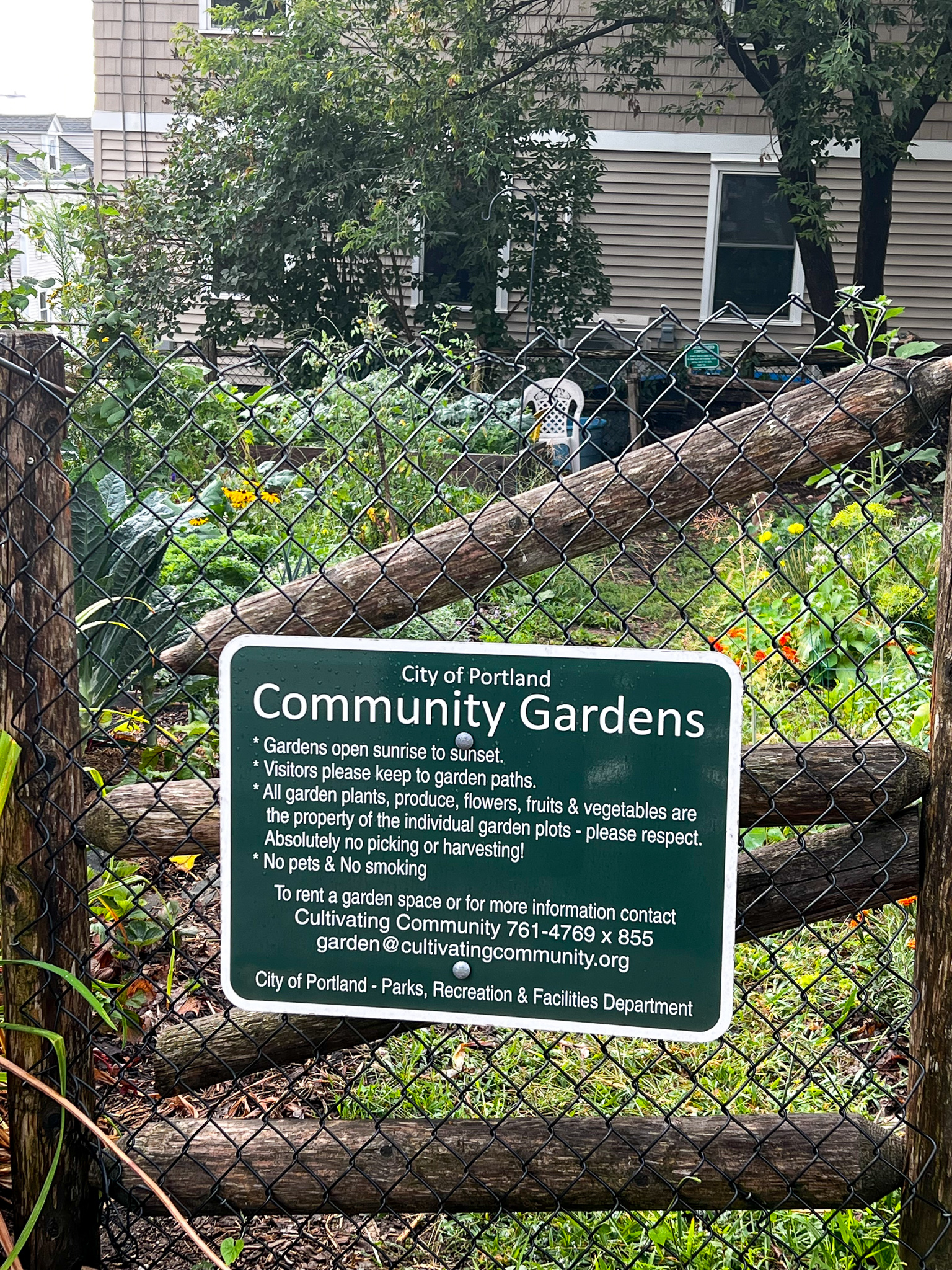 sign on the clark st. Community Garden outlining the rules
