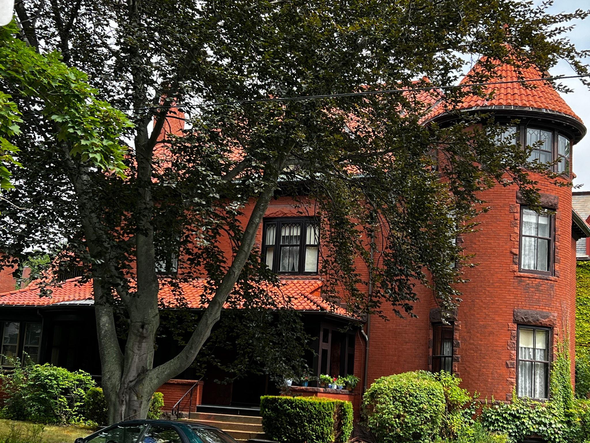 brick large house with a turret