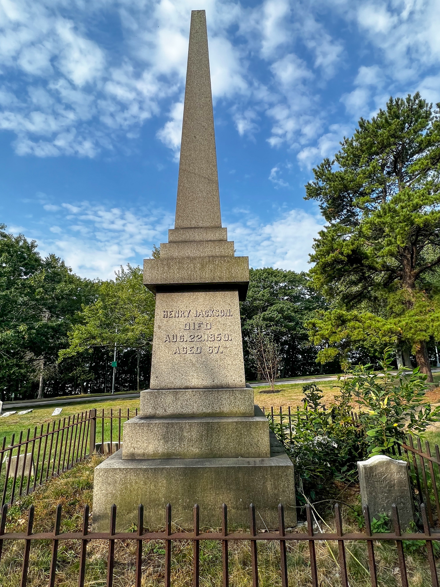 grave stone that is a large obelisk