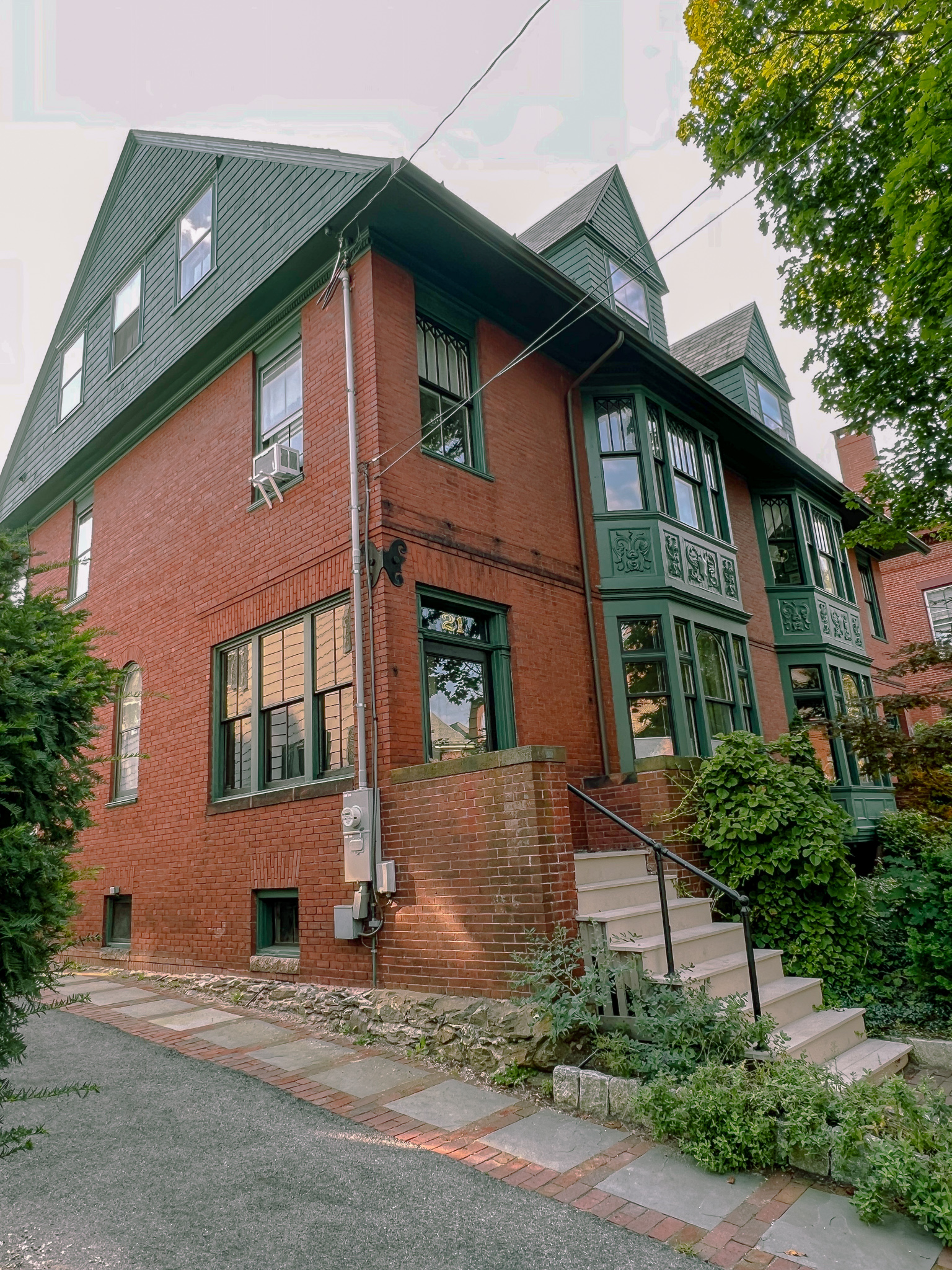 brick house with green trim